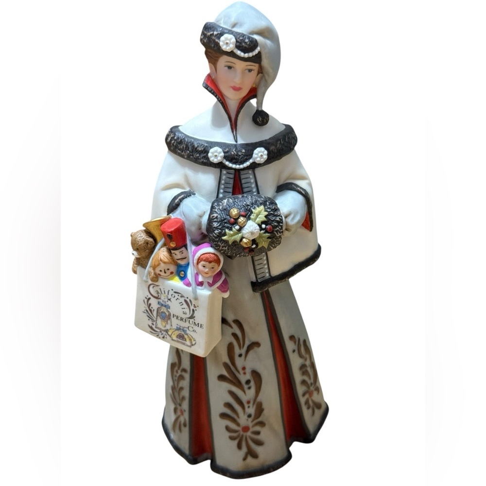 Avon Festive Figurine with Red and Black Details